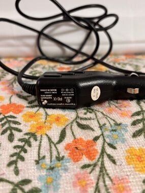 Tom Tom car charger adapter designed to power GPS devices